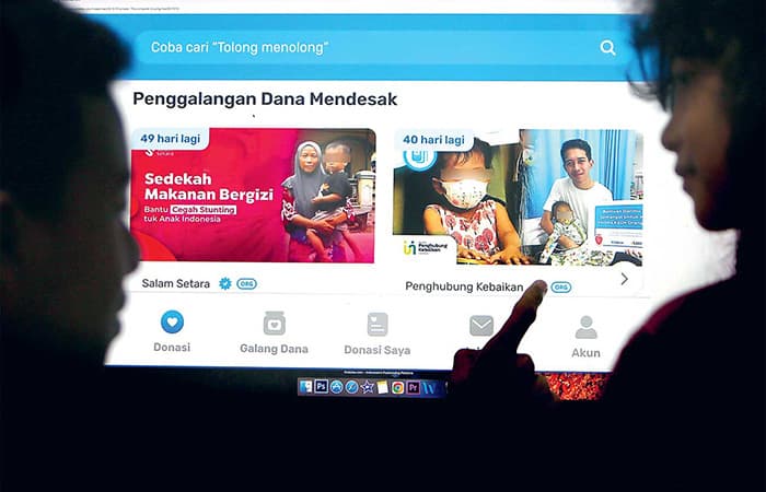 Dilema Masyarakat Indonesia sebagai Negara Paling Dermawan di Dunia, Tidak Kapok Sedekah Walau Ada Potensi Penyelewengan - Image