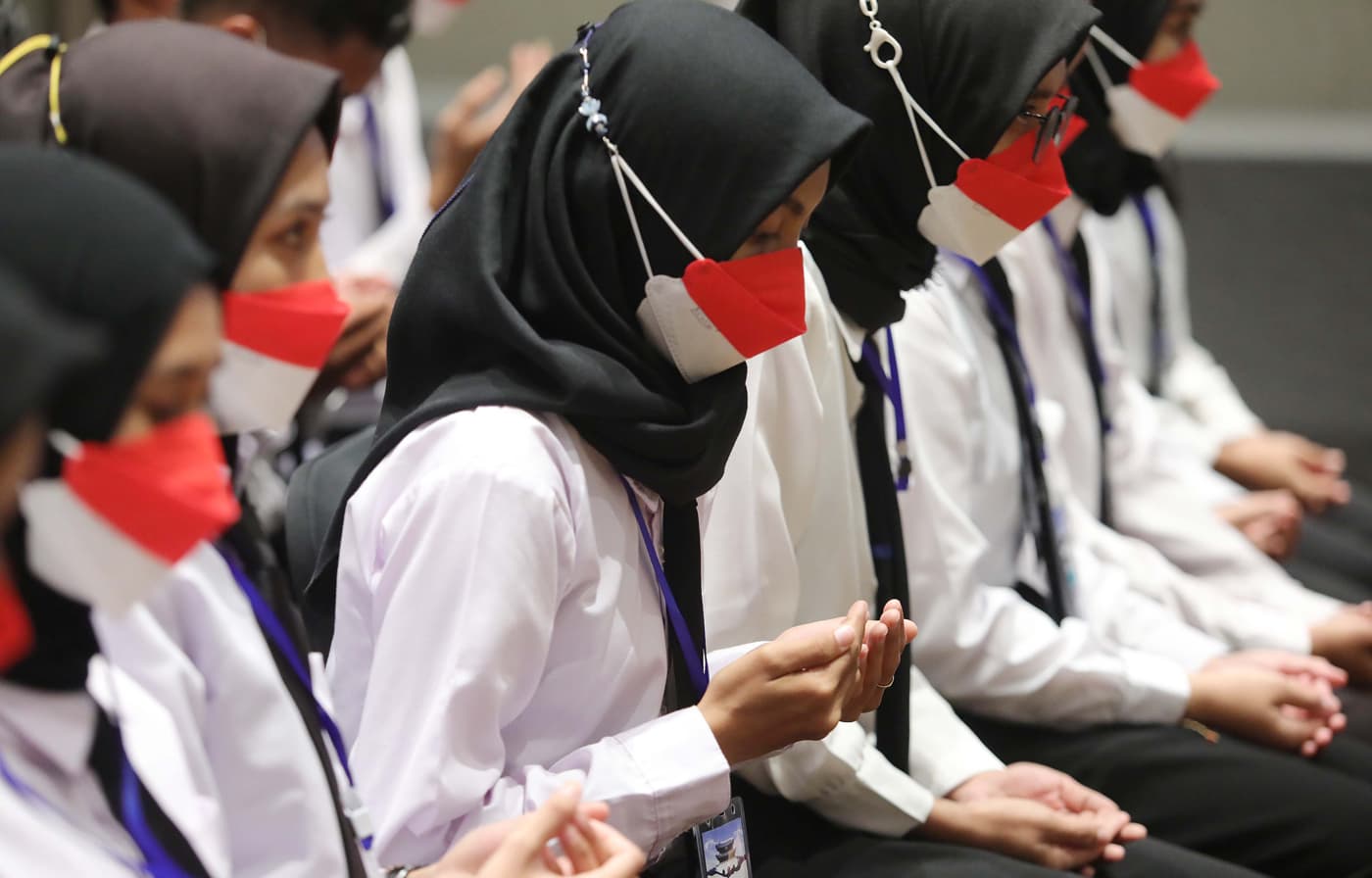 Sejumlah Pekerja Migran mengikuti Pelepasan & Preliminary Education PMI Korea Selatan di Jakarta, Senin (10/4/2023). Program G To G Korea Selatan ini dihadiri 1.263 PMI yang akan bekerja di Korea Selatan sebanyak 159 PMI di bidang Manufaktur dan Perik - Image