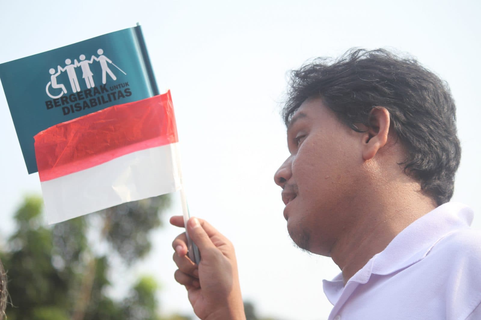 Penyandang disabilitas menggelar pawai dikawasan Monas, Jakarta, Selasa (27/8/2019). Pawai budaya yang diikuti ratusan penyandang disabilitas tersebut untuk meminta pemerintah membentuk Komisi Nasional Disabilitas dan menghapus syarat sehat jasmani dalam - Image